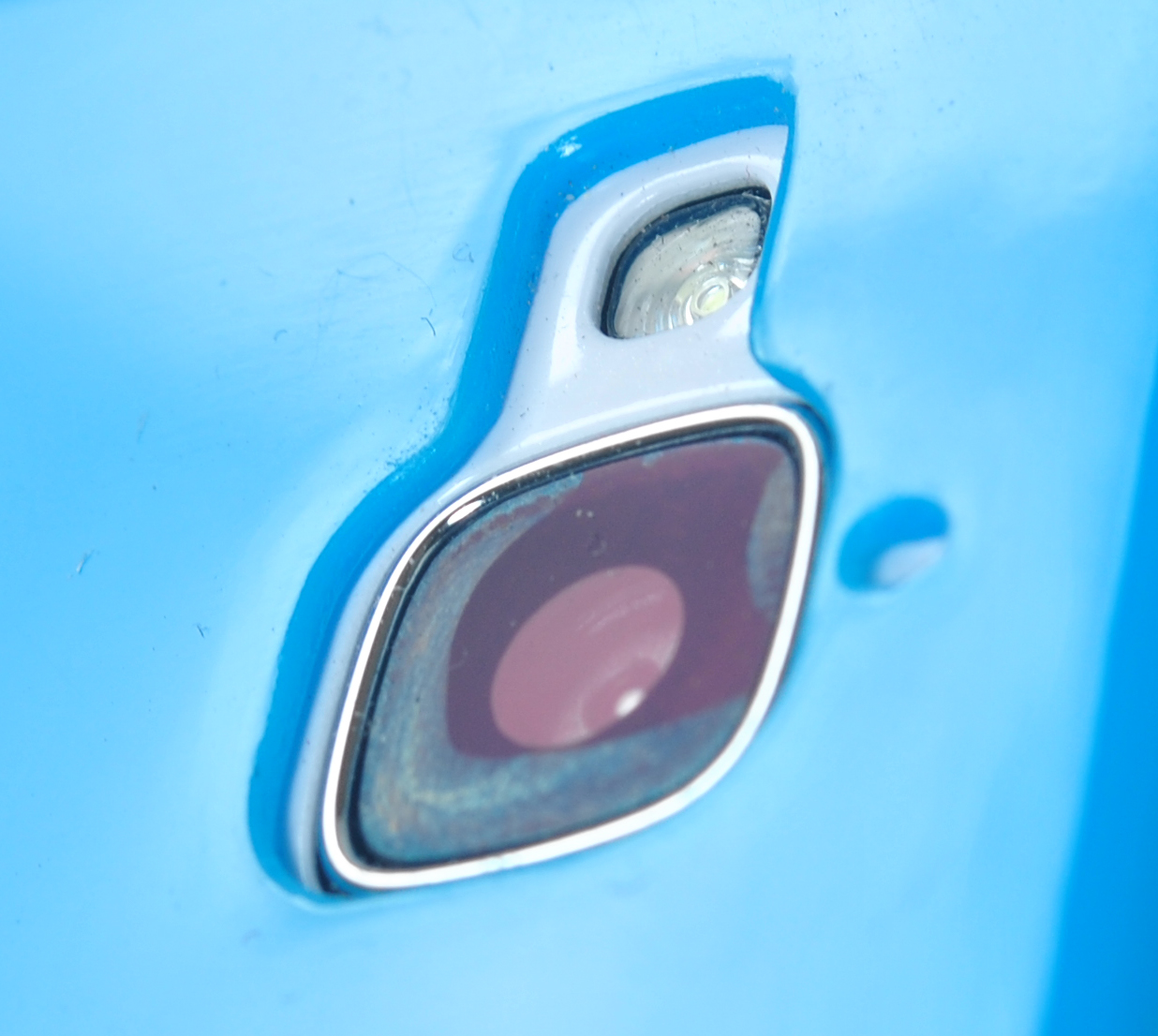 荣耀3C的摄像头玻璃怎么会这样,官方解释一下