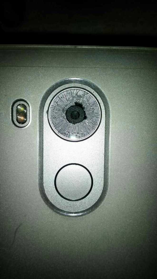 mate8用了两个月,摄像头玻璃碎了