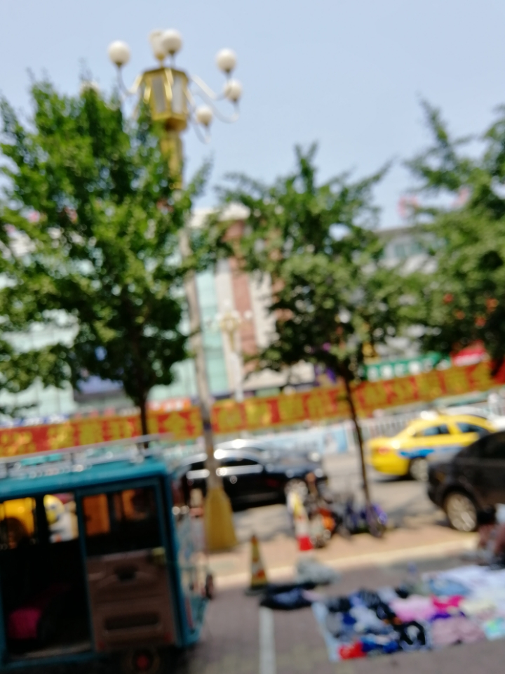 更新系统之后后置摄像头模糊怎么回事